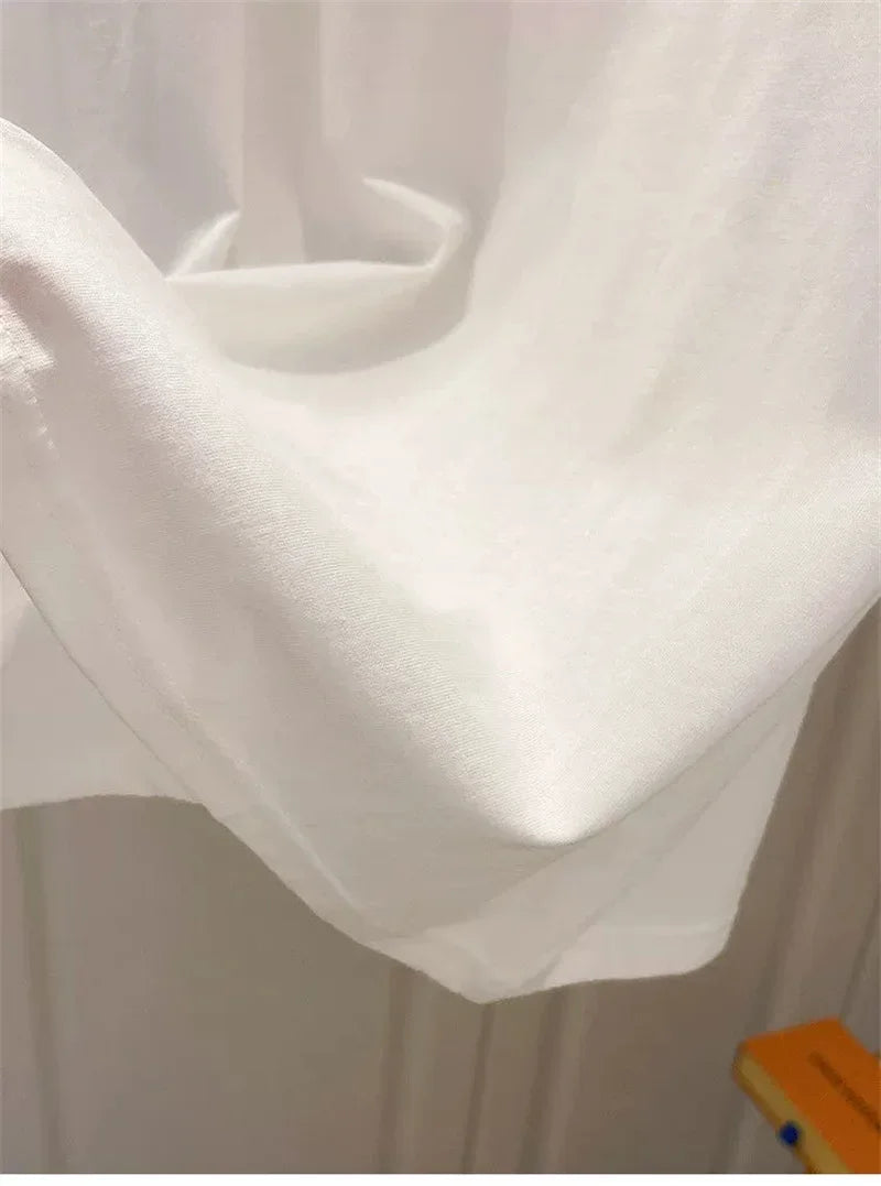 Camiseta mujer  Dulce moda.  cuello redondo y manga abultada.